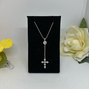Sterling Silver .925  cross dangling charm. With Sterling Silver beaded chain